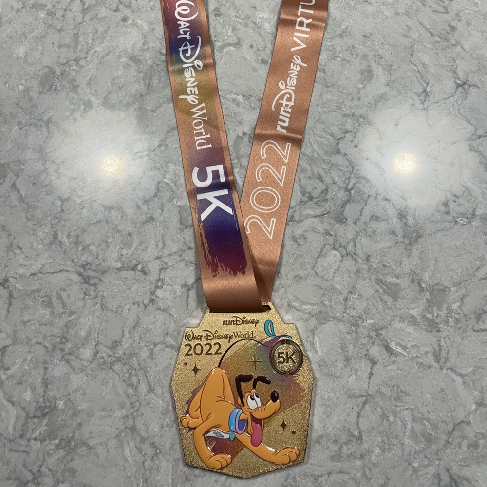 RunDisney 2022 5k medal featuring Pluto